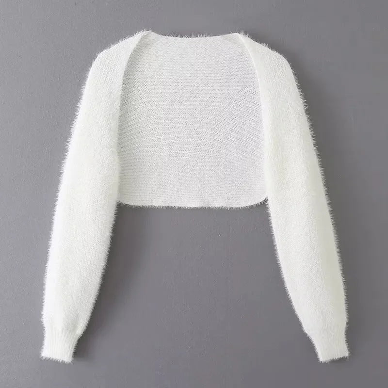 Dame cropped strikpullover med blød uldmix og elegante puffærmer Stilla