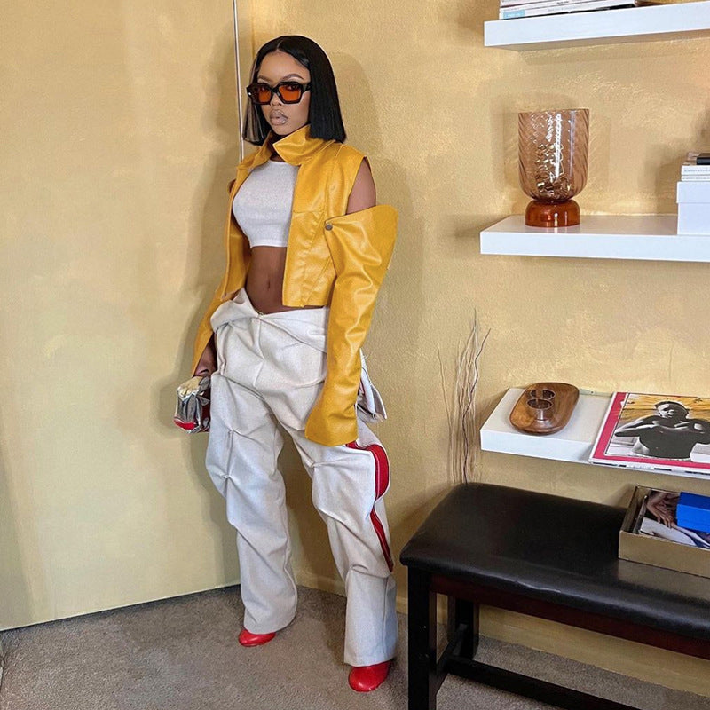 Dame cropped kunstlæder blazer med spændende cut-out ærmer Stilla