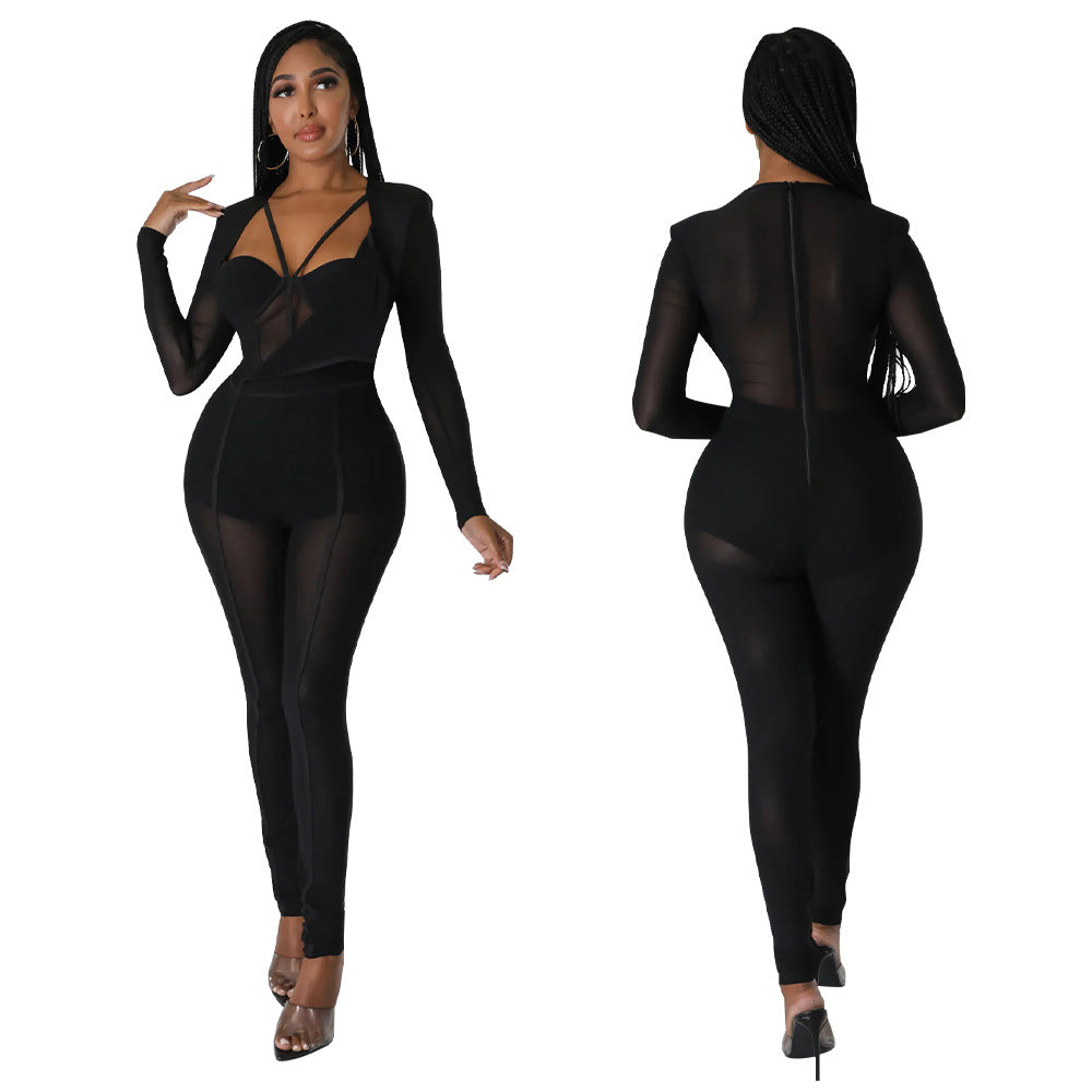 Dame figurtilpasset jumpsuit med innovative cut-out-designs og gennemsigtig stofstruktur Stilla