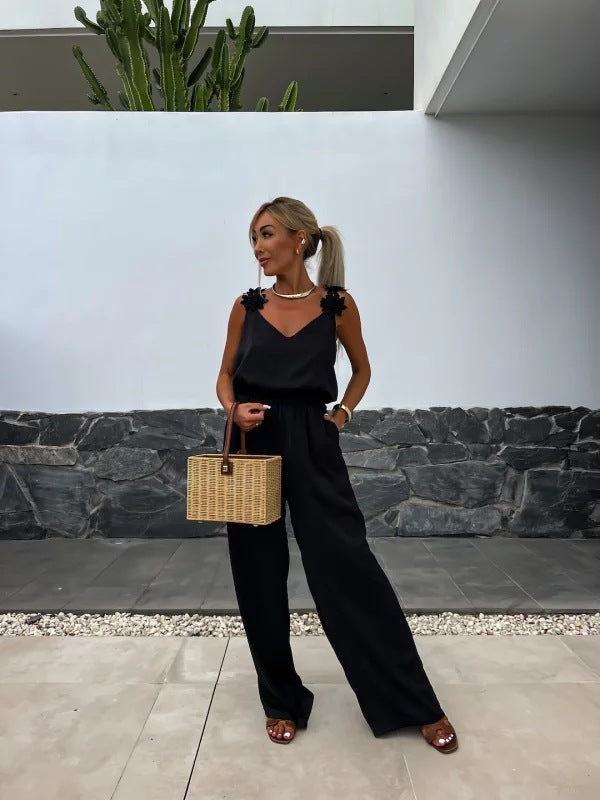 Dame løst skåret jumpsuit med floralt accent og elastisk talje Stilla