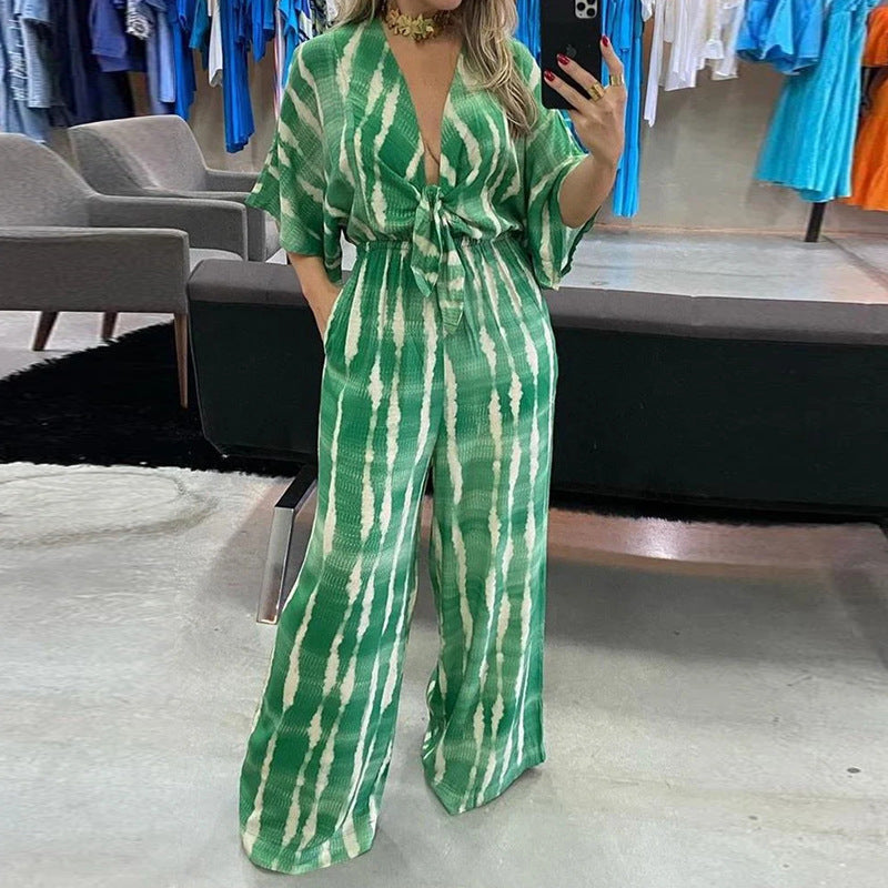 Dame jumpsuit med knyttet talje og bred ben Stilla