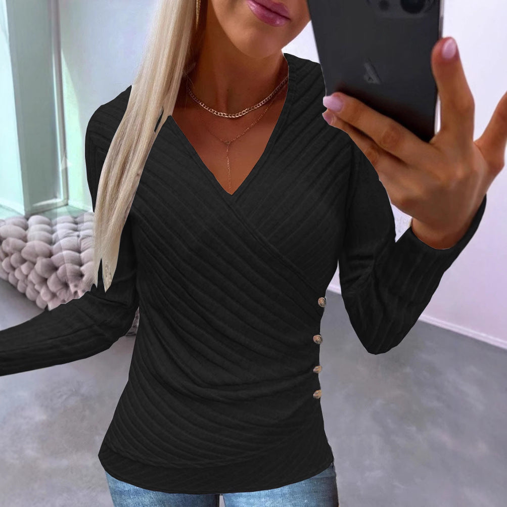 Dame elegant indpakningstop med struktureret design og dekorative knapper Stilla