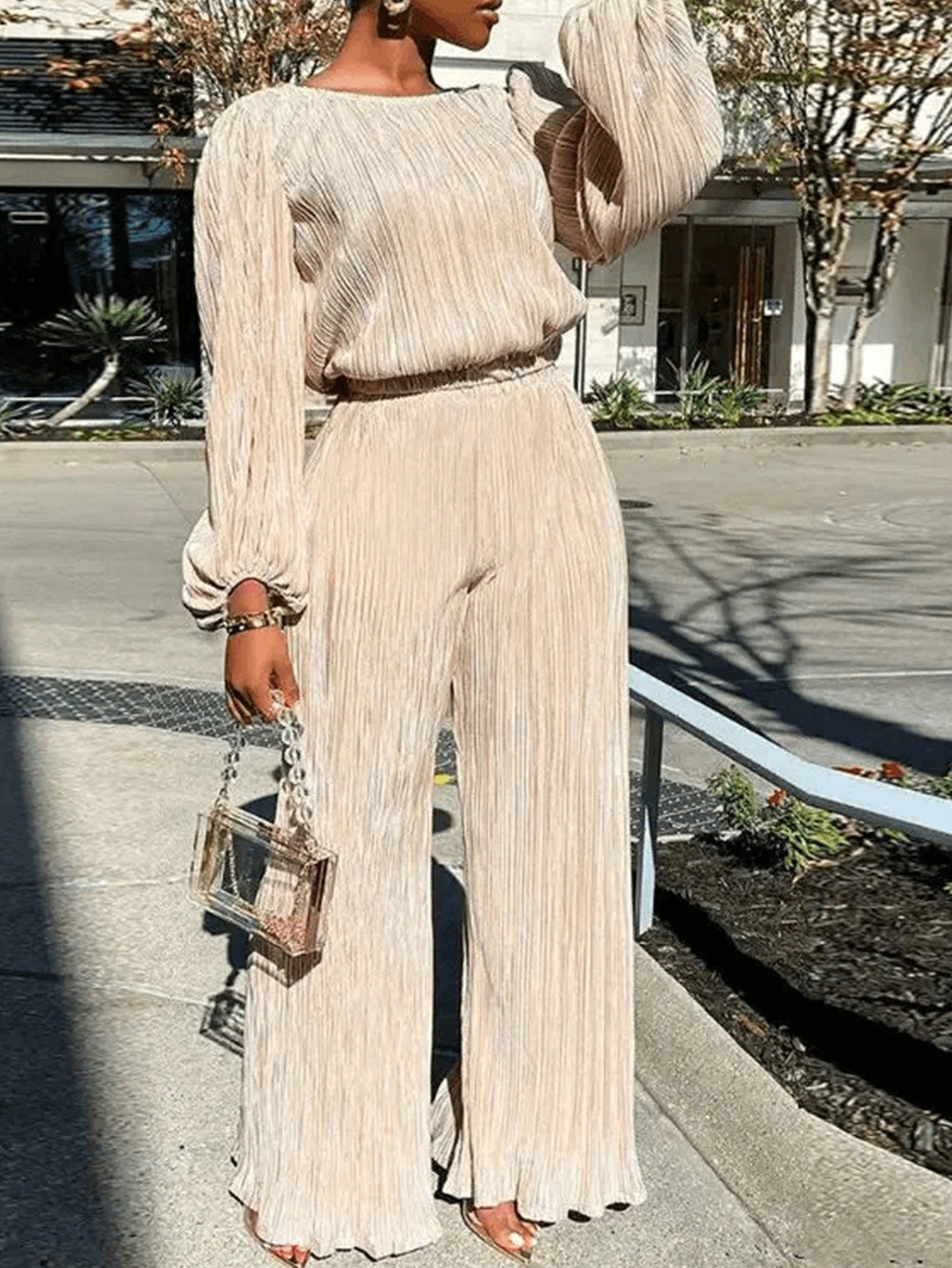 Dame Elegant plisseret jumpsuit med voluminøse ærmer og bredt ben Stilla