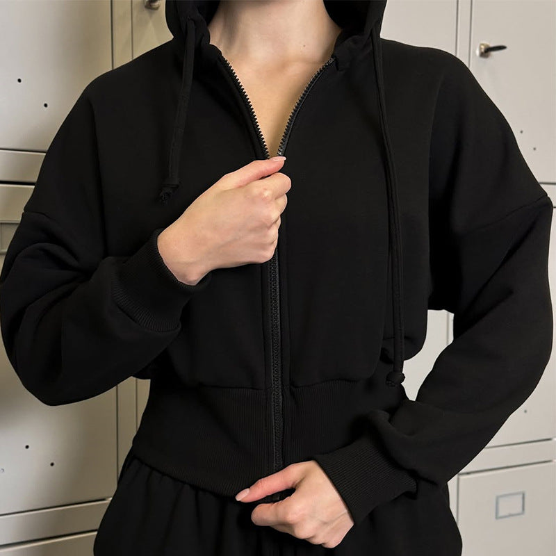 Dame Hoodie-jumpsuit med bred pasform og praktisk taljebælte Stilla