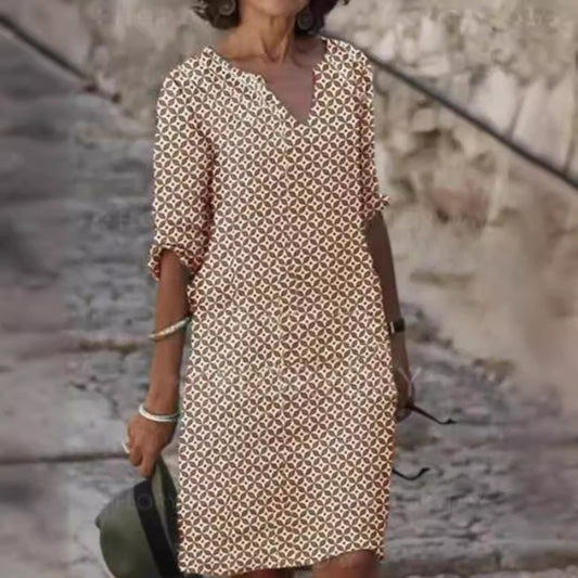 Dame afslappet skjortekjole med blomstermotiv og praktiske sidelommer Stilla