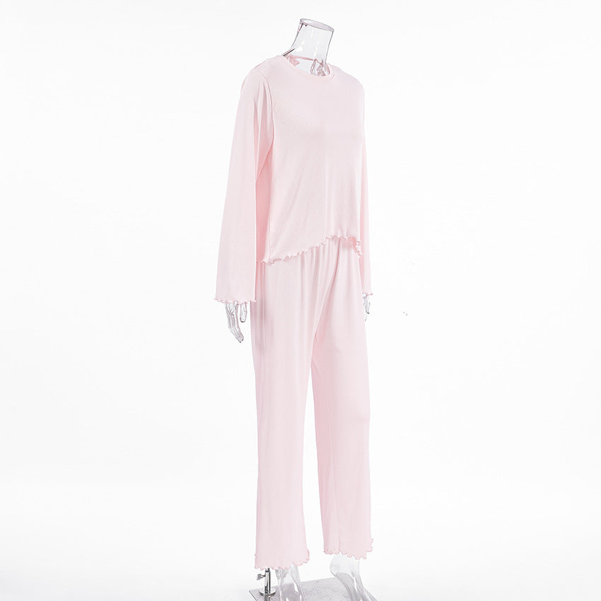 Dame afslappet pyjamasæt med flæsedetaljer og åndbart stof Stilla