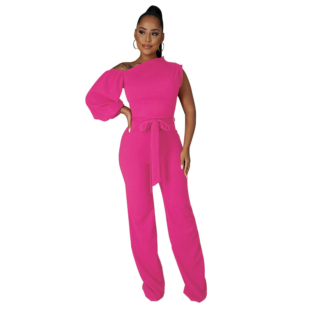 Dame jumpsuit med asymmetrisk snit og voluminøse ærmer Stilla