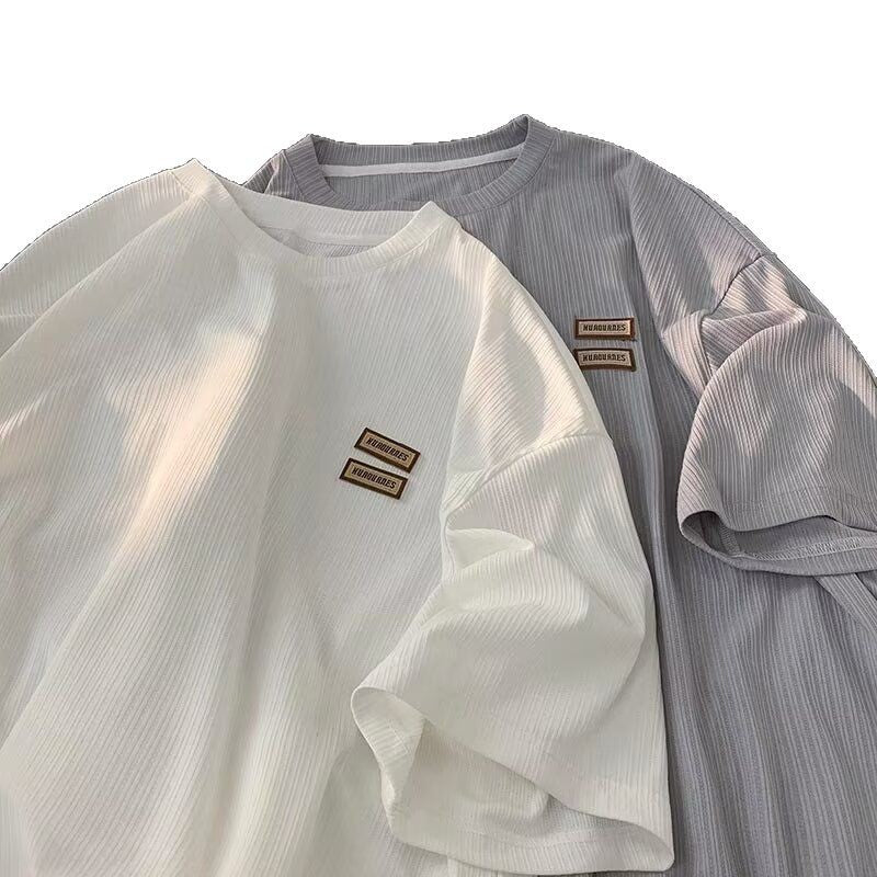 Dame afslappet T-shirt med struktureret stof og moderigtig logo Stilla
