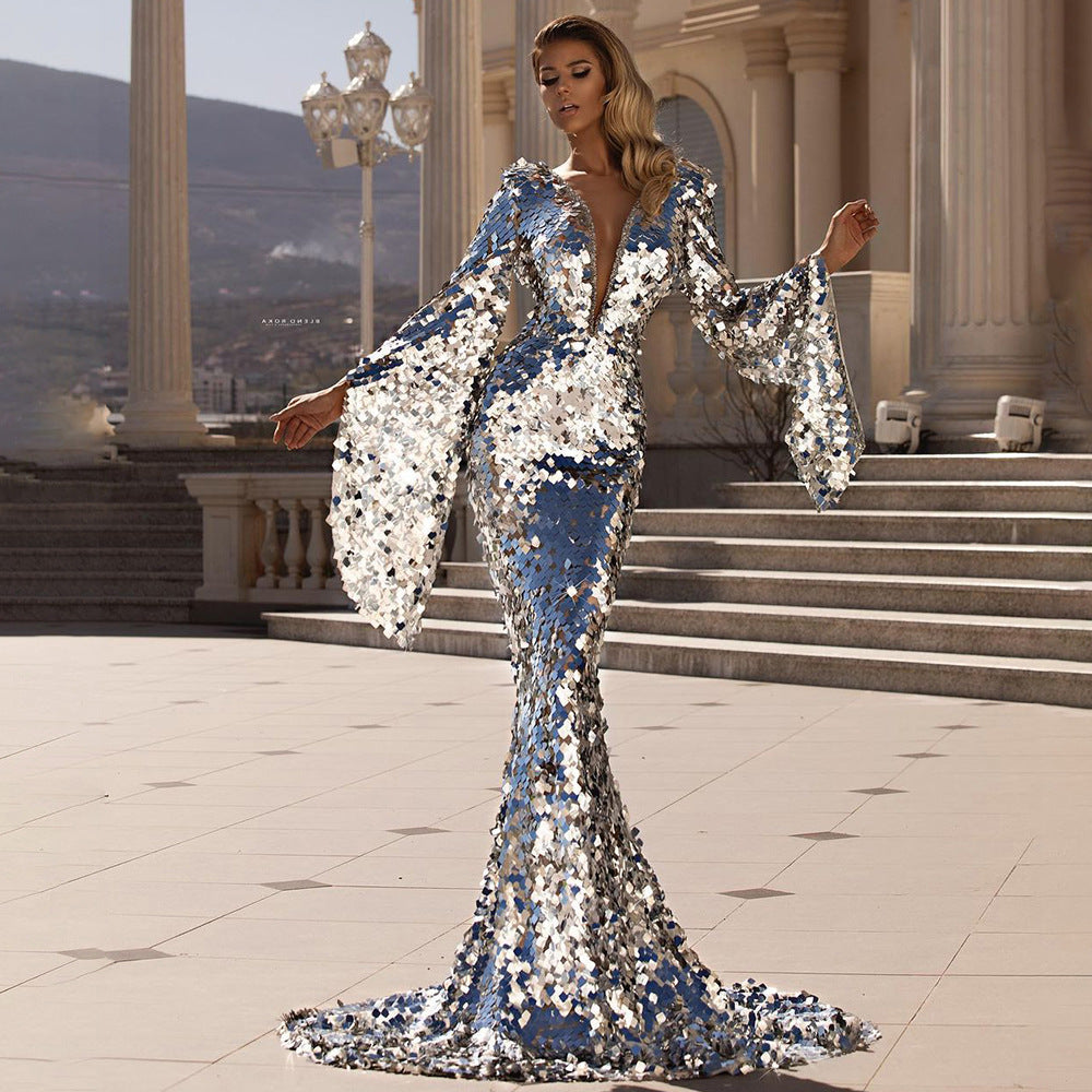 Dame Elegant aftenkjole med skimrende paljetter og dramatiske ærmer Stilla