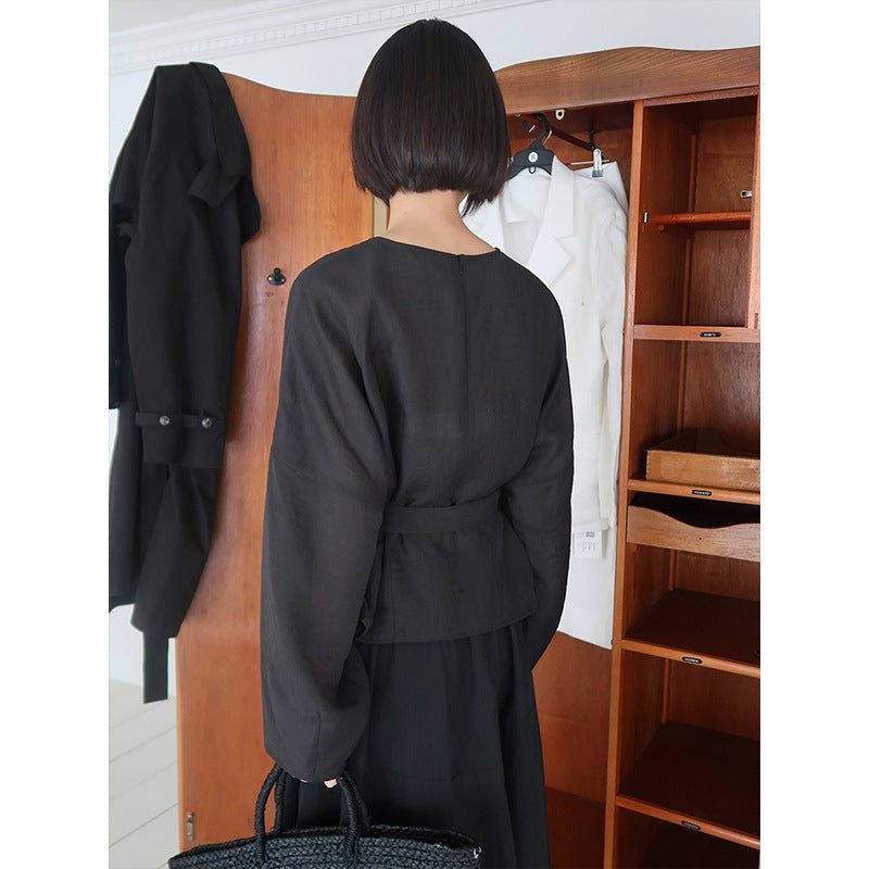 Dame afslappet indpakningsoverdel med elegant design og taljerbar bælte Stilla