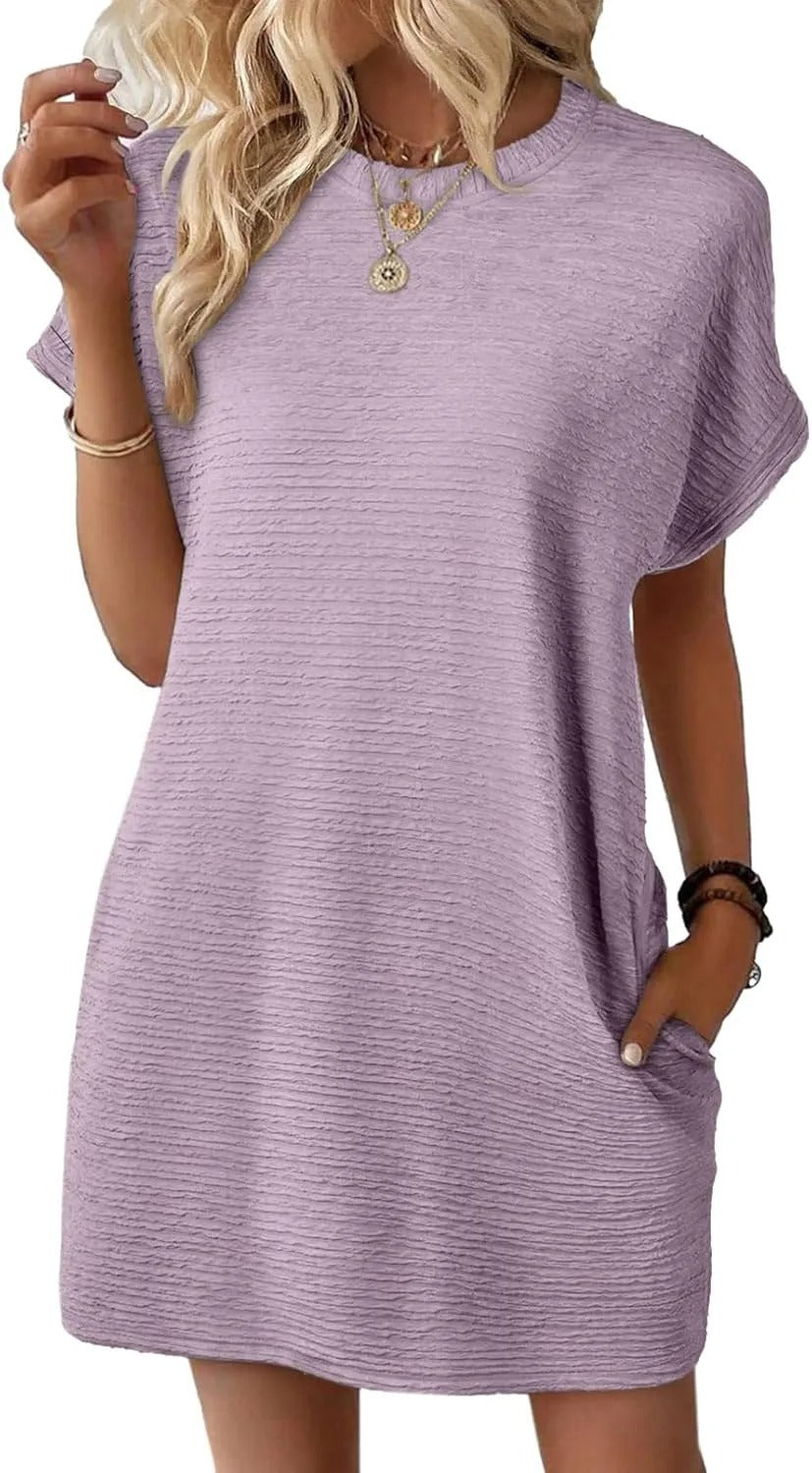 Dame afslappet kortærmet kjole med indvævet teksturmønster og praktiske lommer Stilla