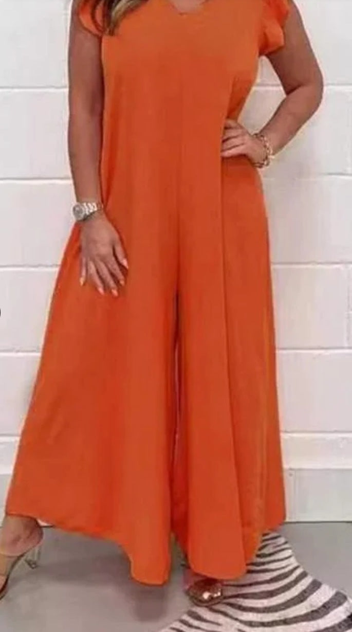Dame jumpsuit med voluminøse ben og elegant V-udskæring Stilla