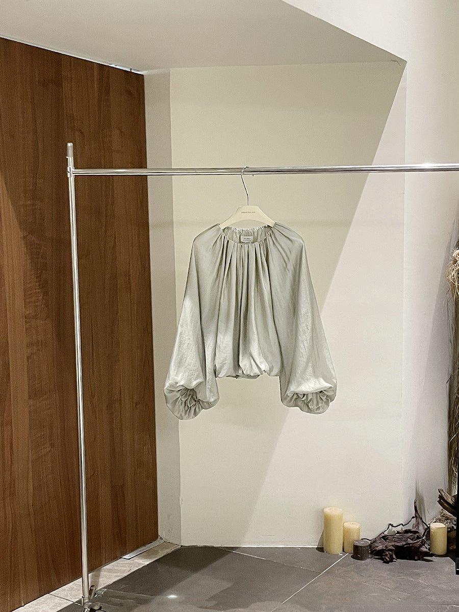 Dame elegant bluse med puffærmer og skinnende finish Stilla