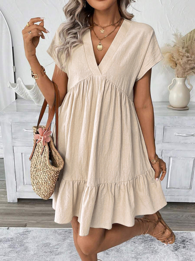 Dame afslappet sommerkjole med V-udskæring og voluminøs bund Stilla