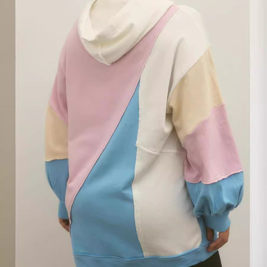 Dame afslappet hættetrøje med innovativt farveblokdesign Stilla