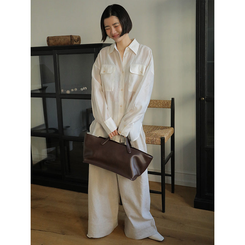 Dame afslappet bluse med fine knapdetaljer og praktiske brystlommer Stilla