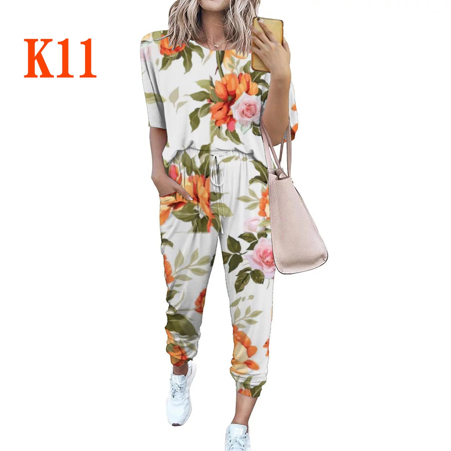 Dame afslappet jumpsuit med blomsterprint og elastisk bånd Stilla