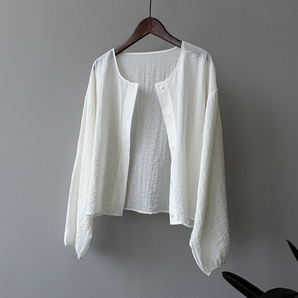 Dame afslappet bluse med knapdetaljer og let stof Stilla