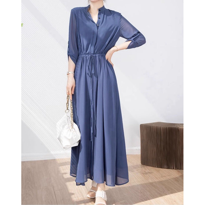 Dame stilfuld jumpsuit med elegant ståkrave og praktiske lommer Stilla