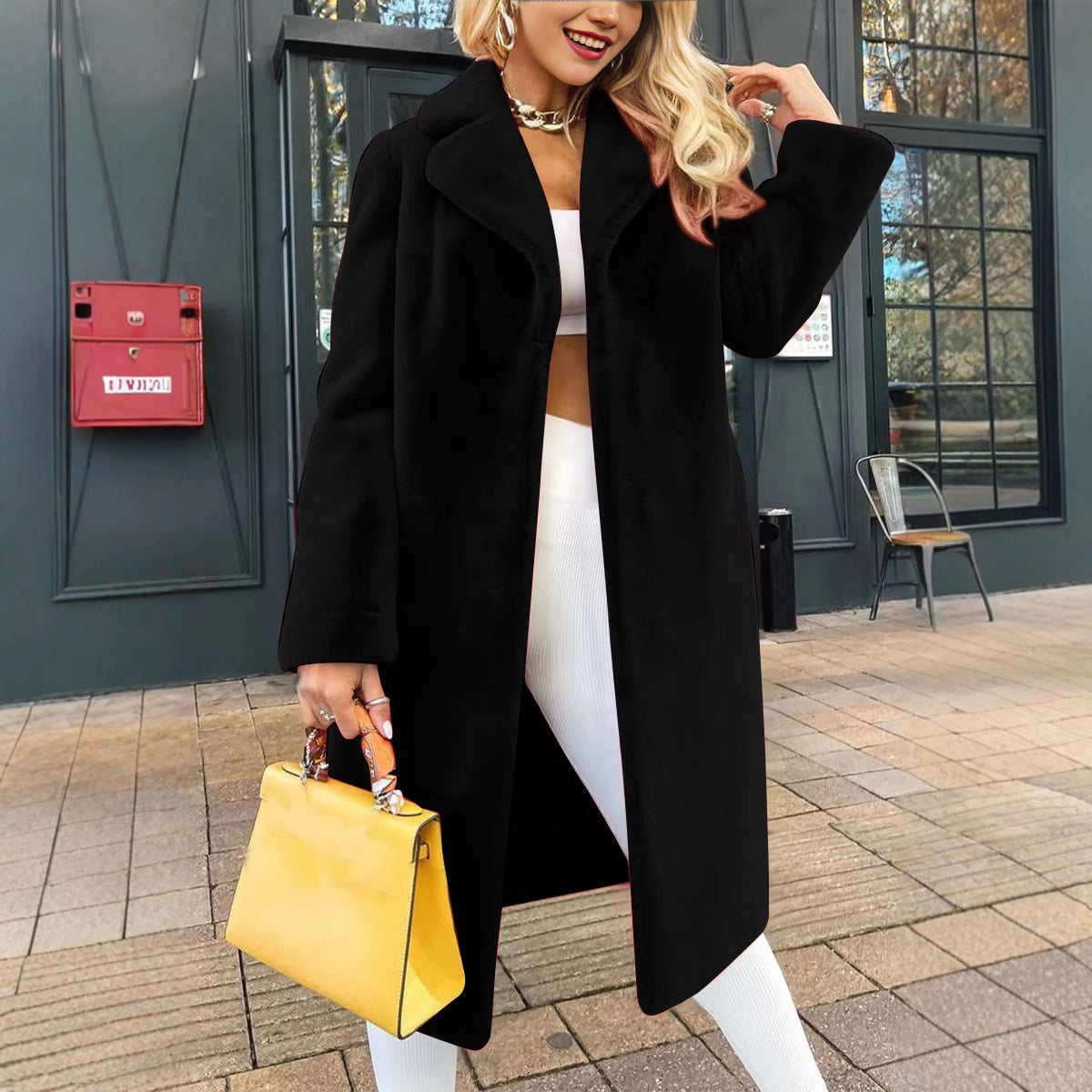 Dame elegant bomuldsfrakke med oversized snit og smart revers Stiila