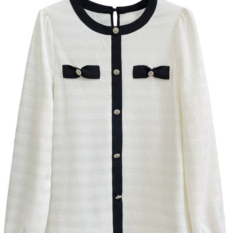 Dame elegant bluse med dekorative sløjfer og knapdetaljer Stilla