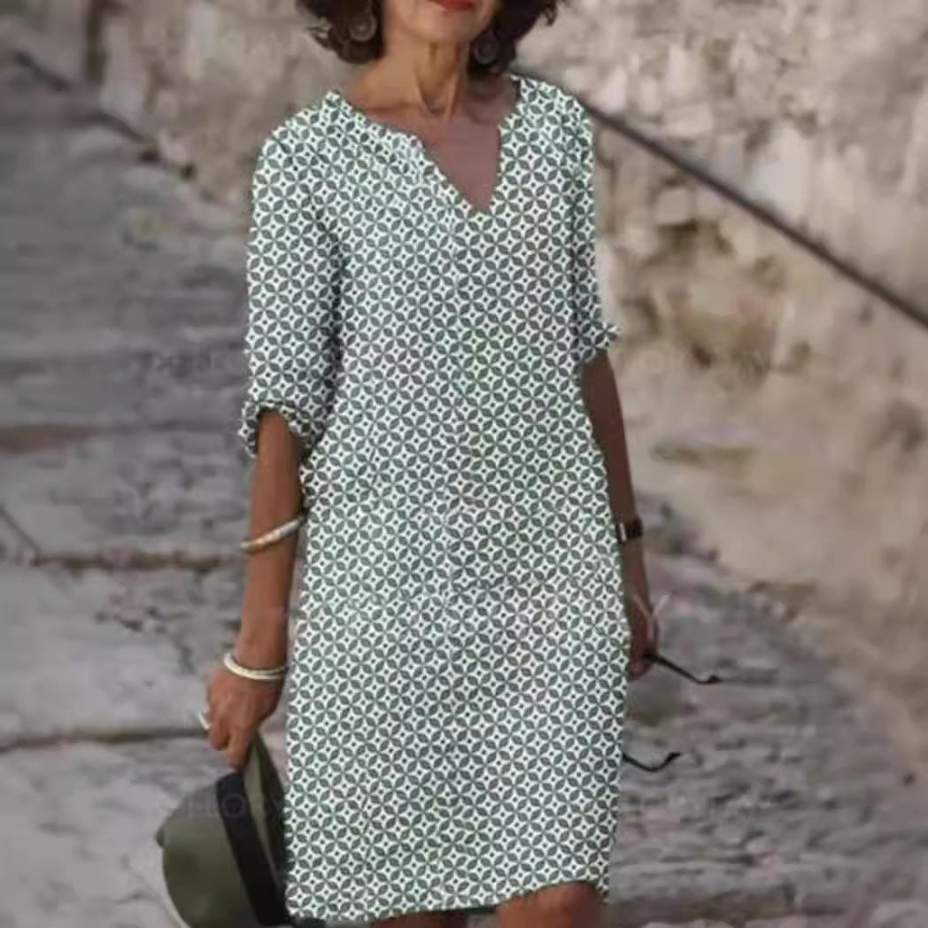 Dame afslappet skjortekjole med blomstermotiv og praktiske sidelommer Stilla