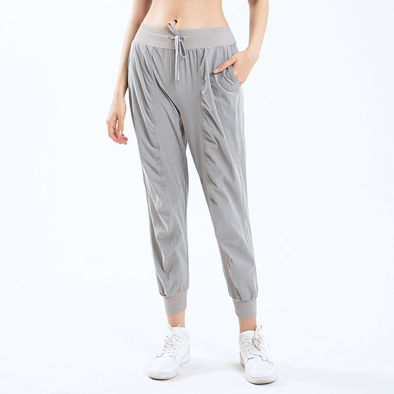 Dame afslappet sportbukser med elastisk talje og sidelommer med lynlås Stilla