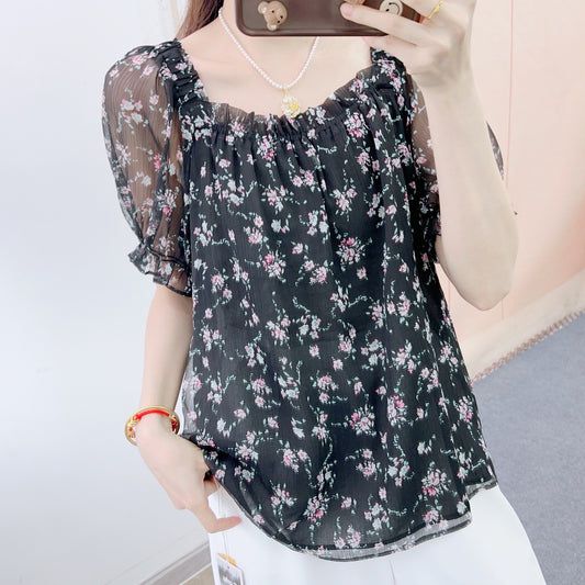 Dame elegant bluse med transparent pufærme og blomsterprint Stilla