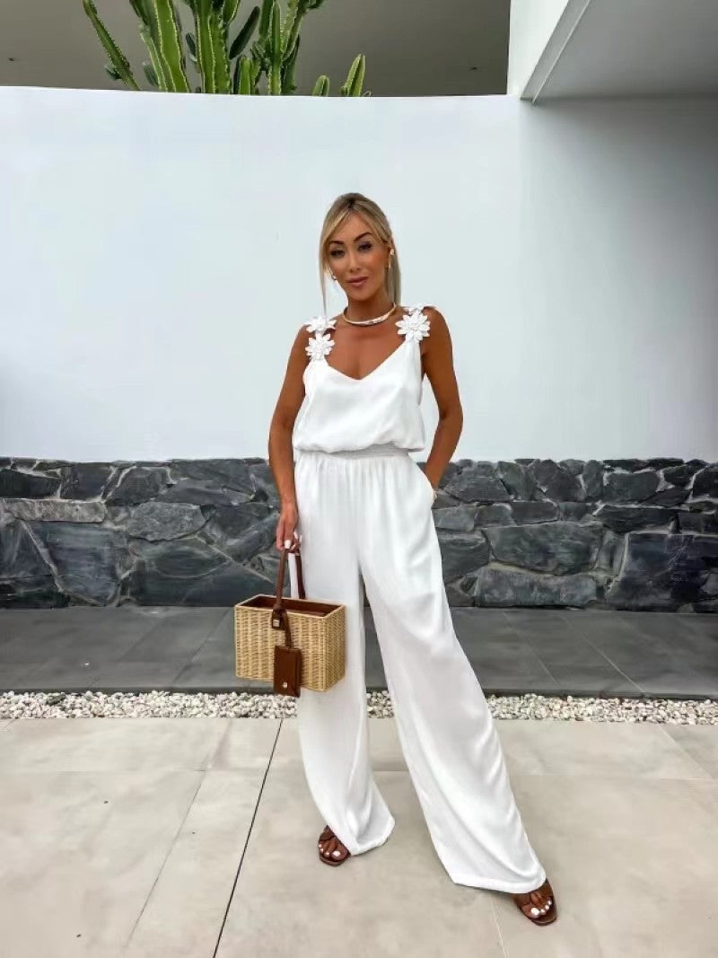 Stilla | Jumpsuit Med Brede Ben og Blomstrede Skuldre