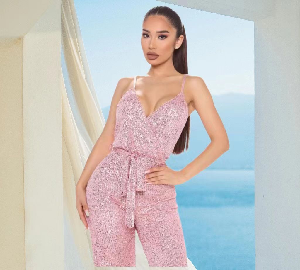 Dame jumpsuit med funkende paletter og dyb V-udskæring Stilla