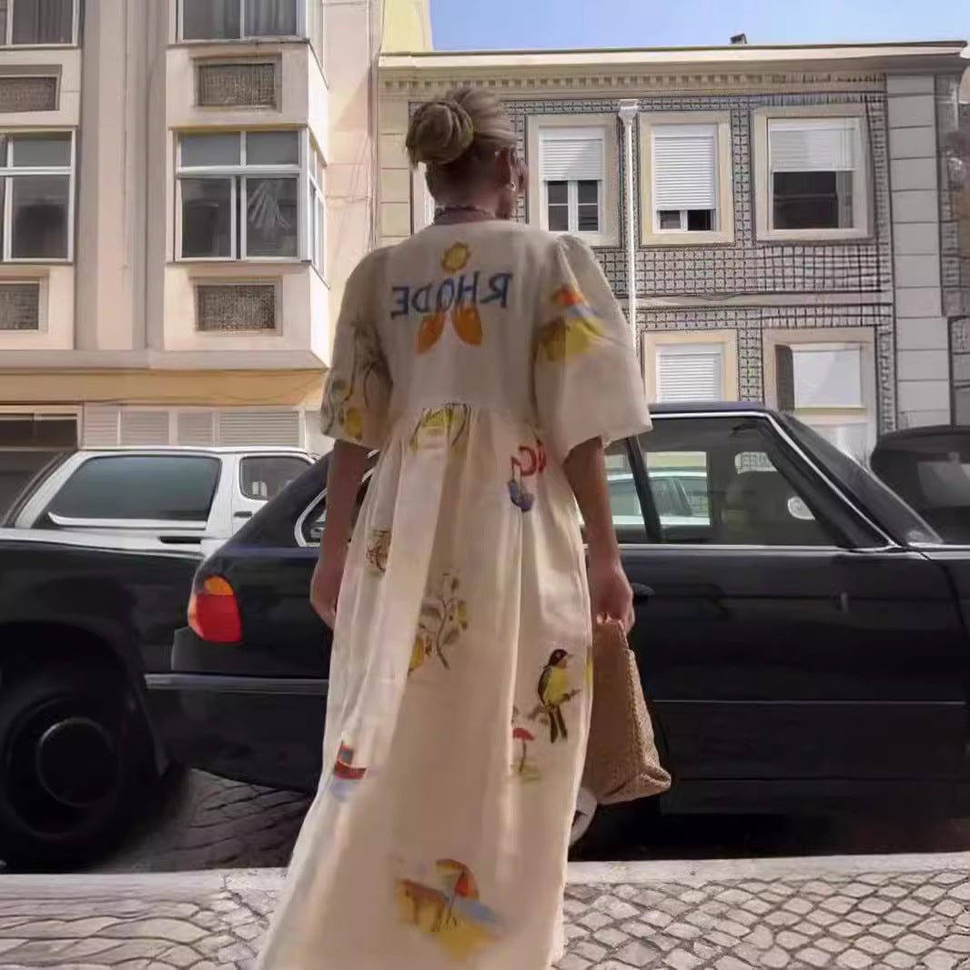 Dame afslappet maxikjole med blomstertryk og knapdetaljer Stilla