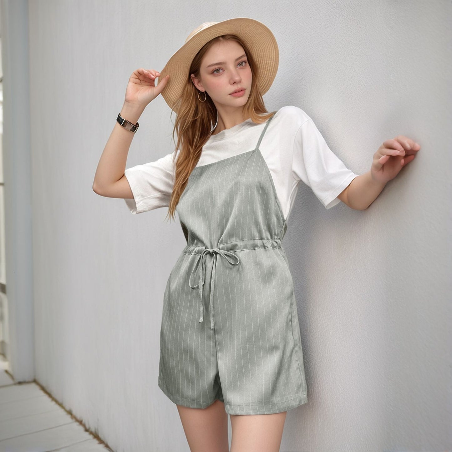 Dame jumpsuit med smart stribet look og justerbar talje snor Stilla
