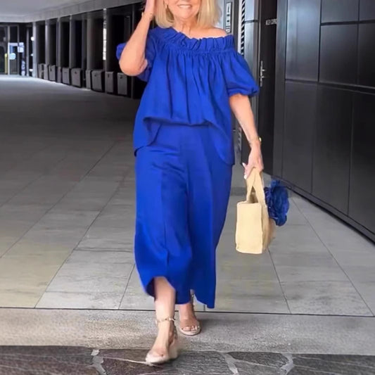 Dame luftig jumpsuit-sæt med voluminøse ærmer og raffineret taljering Stilla