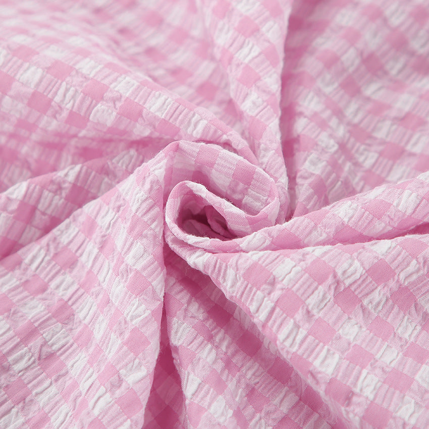 Dame afslappet pyjamasæt med feminine ternede mønstre og komfortabel pasform Stilla