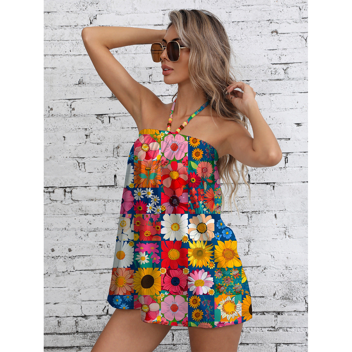 Dame Sommer Jumpsuit med farverigt blomsterdesign og stilfuldt bærerdesign Stilla
