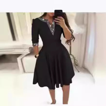 Dame A-linje kjole med ternet krave og figursyet snit Stilla