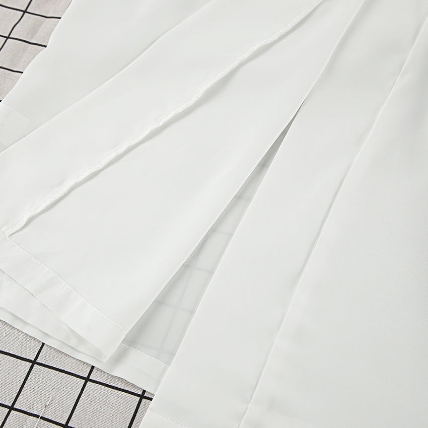 Dame afslappet og elegant sæt bestående af løstsiddende top og shorts Stilla