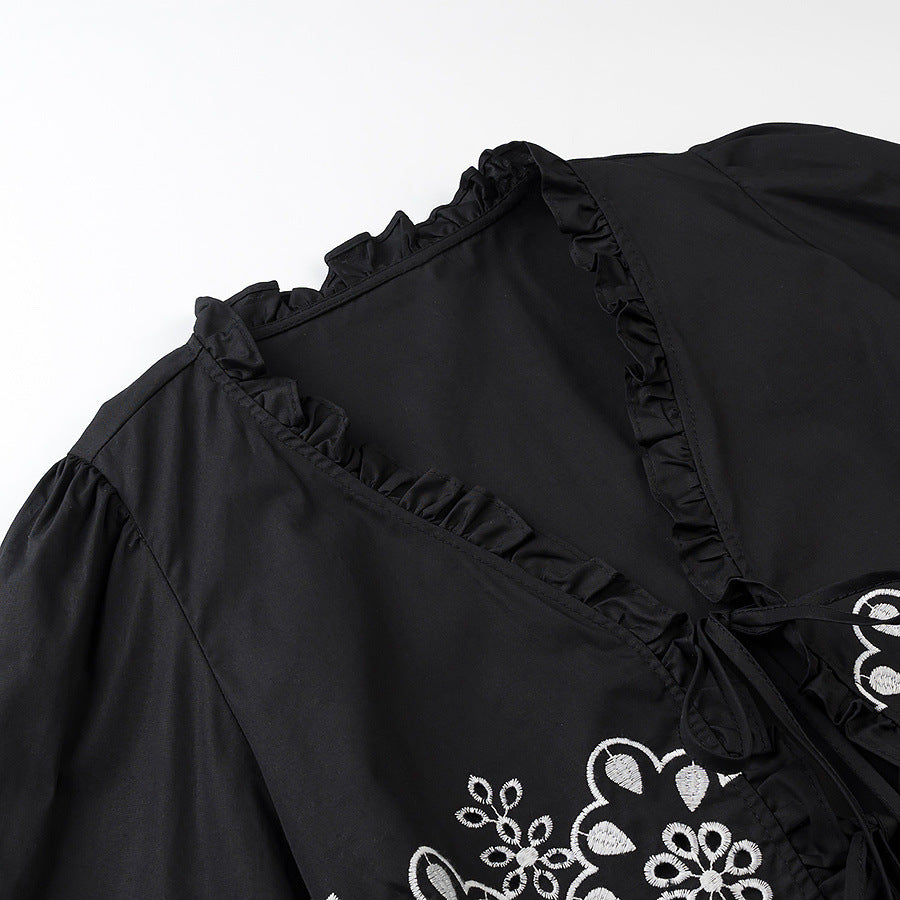 Dame elegant bluse med florale broderi detaljer og flæseudskæring Stilla