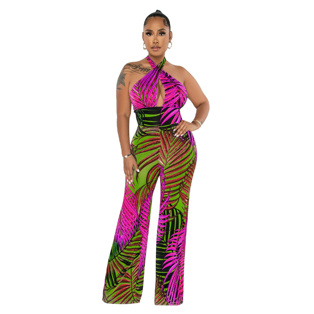 Dame elegant jumpsuit med afslappet halter-design og iøjnefaldende bladmønster Stilla