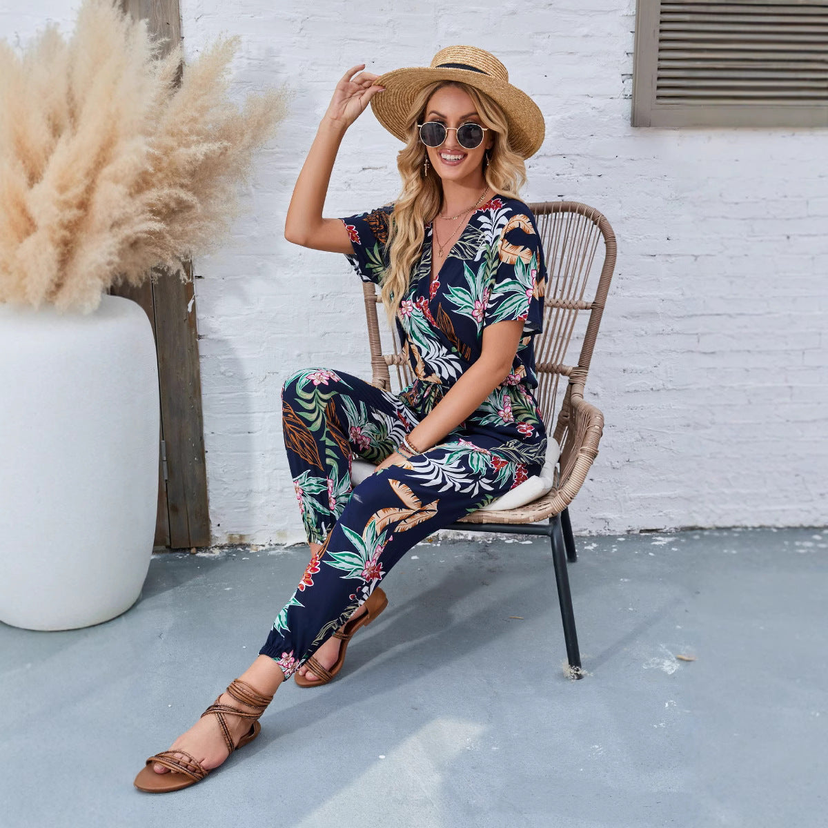 Dame afslappet jumpsuit med blomstret design og elastisk taljejustering Stilla