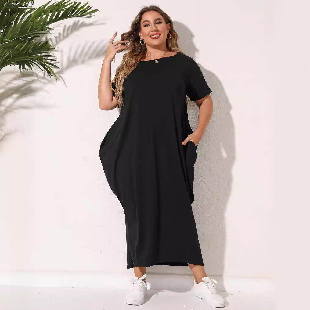 Dame afslappet maxikjole med praktische lommer og rund halsudskæring Stilla