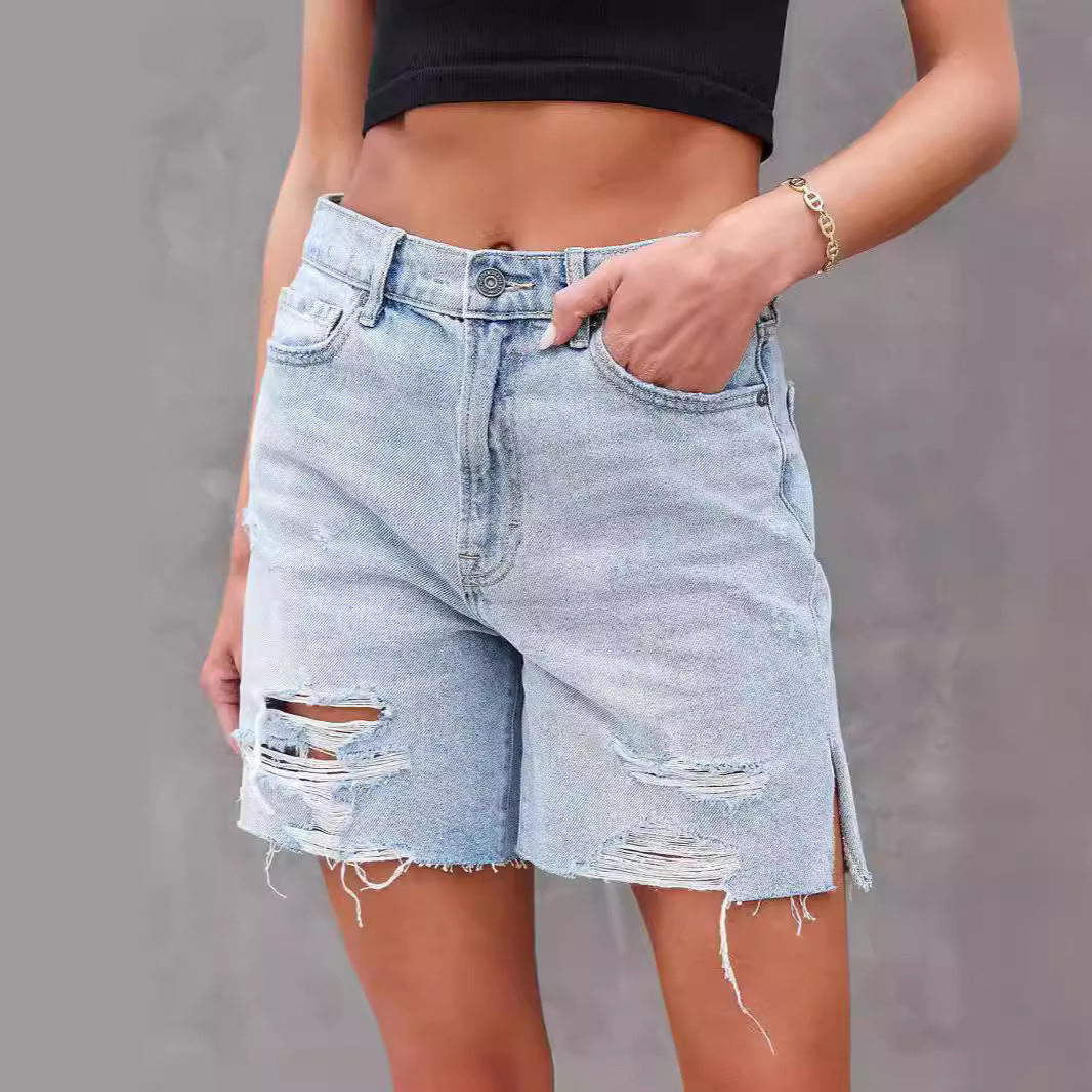 Dame Destroyed Denim Shorts i moderne vintage-stil med afslappede revner og frynset søm Stilla