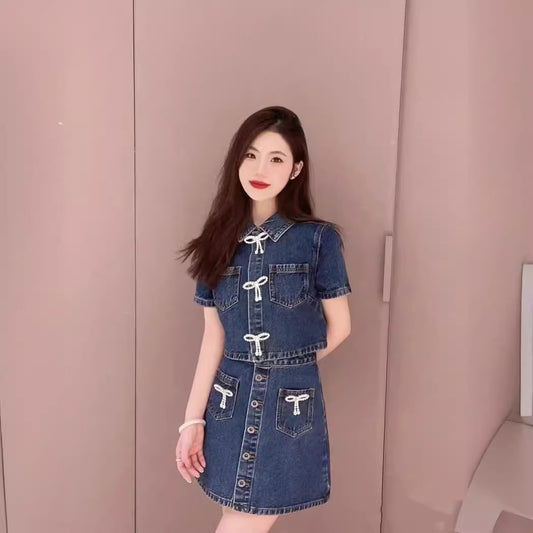 Dame Denim Mini Skirt med dekorative lommer og knaplukning Stilla