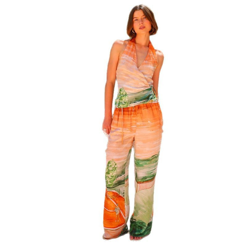 Dame sommerlig jumpsuit med farverigt mønster og elastisk taljetræk Stilla