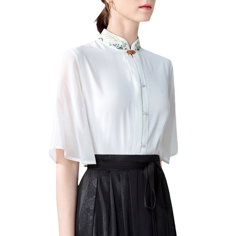 Dame elegant bluse med blomsterbroderier og gennemsigtige ærmer Stilla