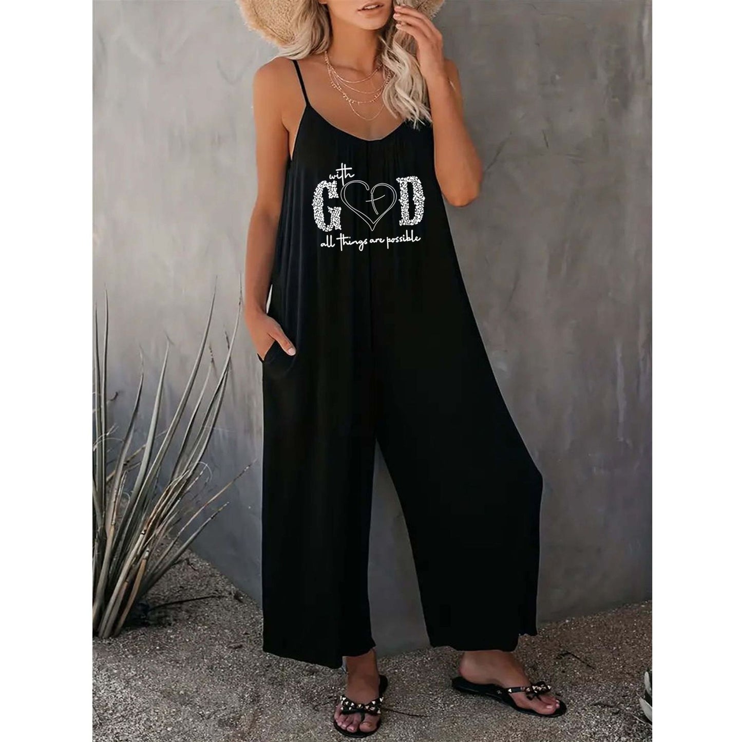 Dame jumpsuit med justerbare stropper og motiverende tryk Stilla