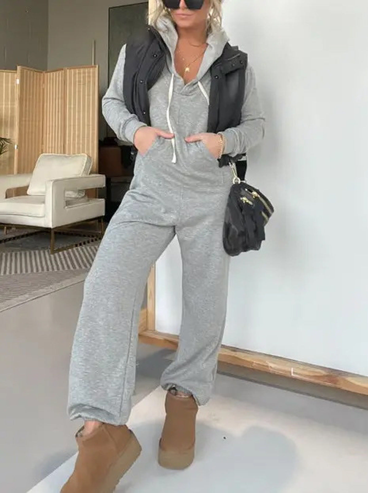 Dame hætte jumpsuit med afslappet snit og praktiske lommer Stilla