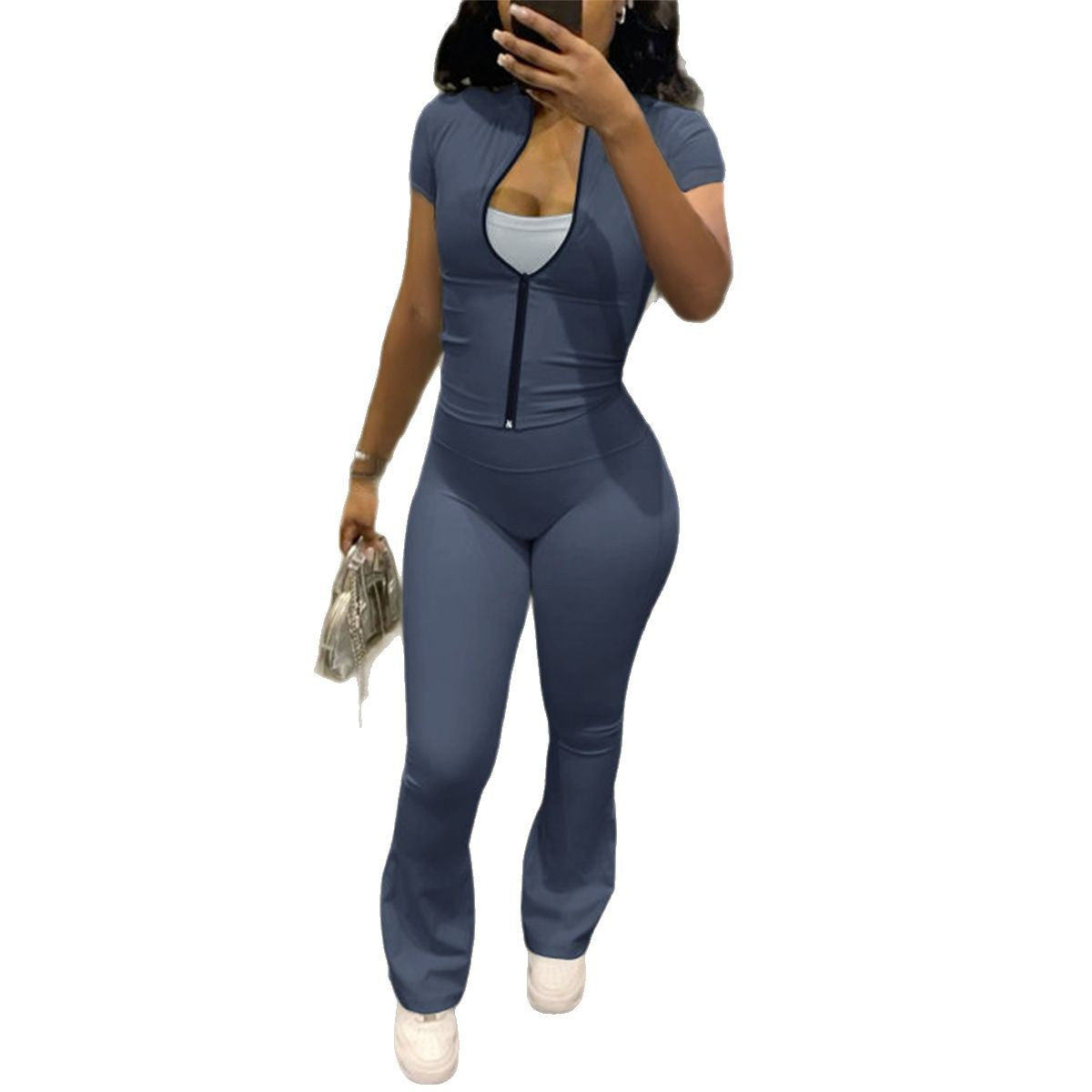 Dame figurtilpasset jumpsuit med kort arm og trendy zip-design Stilla