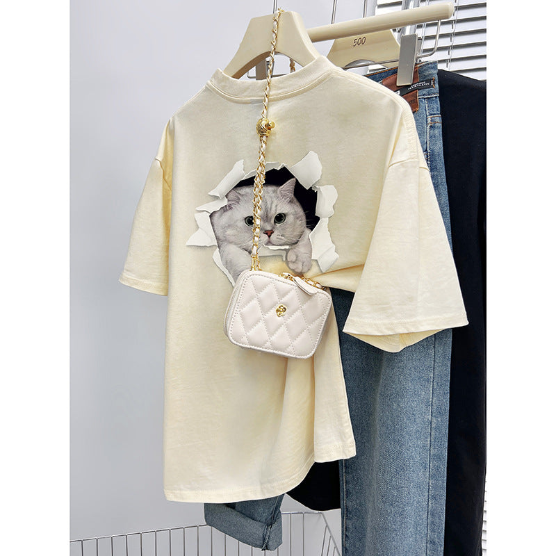 Dame T-shirt med kreativt kattemotiv gennem gennemboret væg Stilla