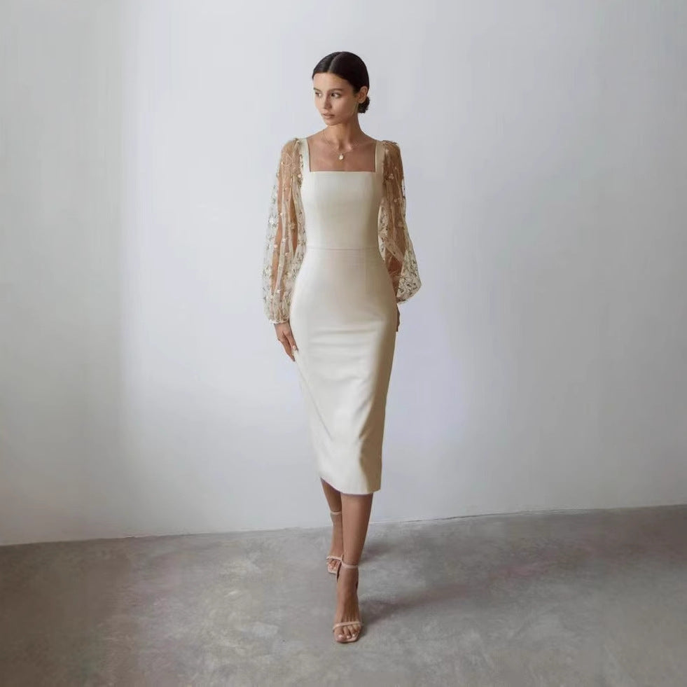 Dame Elegant aftenkjole med gennemsigtige, broderede ærmer Stilla